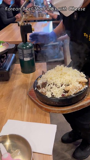 Eating Korean Short Ribs (Kalbi Jjim) with blow-torched cheese 🔥 #hungryfam #tastetest #foodreview #eatwithme #foodies #foodvlog #foodadventure #koreanfood #asianfood #cheesepull | Hungry OC
