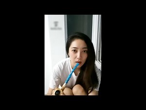 Beautiful Chinese girl Nadi smokes a pipe. 483