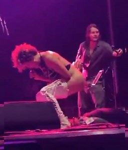 Singer Pees on Fan's Face on Stage
