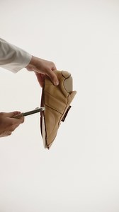 Discover the creation of Tod’s T Vintage Sneakers. Each detail is preciously crafted by hand, showcasing Tod’s dedication to quality and tradition. Explore more at: https://rebrand.ly/8w4eb4b #TodsFW24 #Tods | Tod's