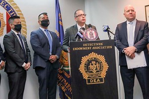 DEA files suit for Asian cop in bias attack