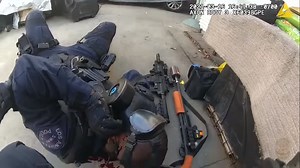 Dramatic moment LAPD SWAT officer is shot in the face and chest before gunman is killed in standoff