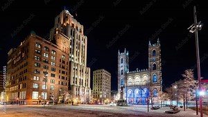 Night view of place ville marie and christ church cathedral in montreal Stock ビデオ