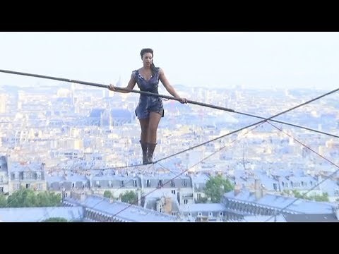 Hanging by a thread: Tightrope walker achieves 35m high stunt in Paris