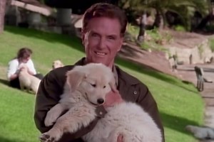 Mystery Solved! The Most Adorable ‘Unsolved Mysteries’ Blooper Is Robert Stack Struggling To Hold a Puppy