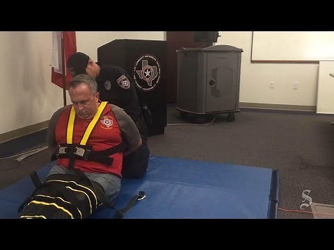Cedar Park police officer Robert Ducroz demonstrates 'Wrap'