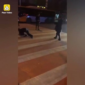 19 reactions · 3 comments | Crawling on crossing walk to punish employees for not reaching their goals? | PearVideo | Facebook