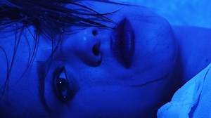 brutalization, upheaval - brutalized face of girl upset by drugs- macro