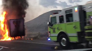 #VideoFire: One of our readers captured this semi truck trailer on fire this morning at about 6:40am on 1-80 Eastbound between Green River and Rock Springs. [Video by Lisa Winer] | Sweetwater NOW