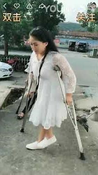 Polio crippled couple crutching and falling.