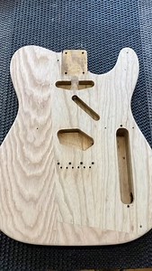 #fenderfriday Restoration #storytime 1952 @fender Telecaster body Although we did see several 50s factory patched bodies, where they did remove wood knots and insert grain matched dowels, or where they would use partial veneers to correct mistakes happened during construction, this one is definitely the wildest ! This is a factory 3 pieces ash body from 1952, with a very interesting “V” shaped middle piece, resulting in all diagonal junctions, that has a front veneer and a back insert to correct