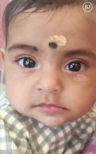 Cutest ears now shining with love! 💖 #LittleLuxury✨ #PiercingGlow . . . #babyearpiercing #firstsparkle #preciousmoments #safeandgentle #bindujewellery #bindujewellerymulayankavu #elegantBeginnings #tinyearsbigsmiles #jewelleryforlittleones #shinebright #timelesstradition #specialmoments #babyjewellery #cherishedmemories #mulayankavu | Bindu Jewellery