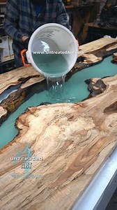 Teal resin pour on a 11ft Spalted Maple dining table ⚡🔥🌊 #UntreatedArt @untreatedart #epoxy #maple #handmade #diningtable #epoxyresin #resintable #epoxyart #resin #wood #woodworking #interiordesign #handmade #woodshop #woodwork #woodworker #woodart #build #wooddesign #rivertable #spalted #maker | UnTreated
