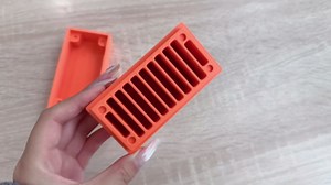Orange Sewing Machine Needle Storage Box – Multi-Slot Organizer for Various Needle Sizes