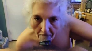 old bitch with no teeth chewing brown cock