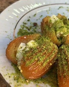Sweet temtation - "tulumba". An Ottoman dessert, deep-fried and soaked in syrop... and in this case, to top it off, filled with clotted cream... yummy video: @yemekodasii | DMT Your Turkish Delight