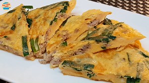 Duck omelet is a very dense and rich fried egg, perfect for adding extra toppings like minced meat and chopped veggies. This recipe uses minced pork and chives, making a balanced dish. Enjoy! Ingredients ↓ Duck Omelette with Chives Recipe Ingredients: 4 duck eggs 1/2 cup minced pork, optional 8 stalks of Chinese chives, cut into 1-inch length 1 knob of ginger, cut into strips 1/4 tsp sesame seed oil 1/4 tsp pepper 1 tsp light soy sauce 1 tsp oyster sauce 1/4 tsp salt | Home Cooking with Somjit
