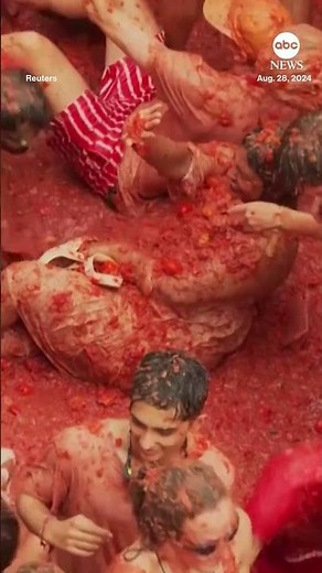 Revelers throw tomatoes in Spain's La Tomatina festival