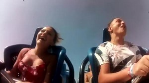 Sexy boobs fall out on a rollercoaster