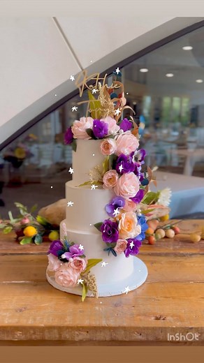 “The cake was wonderful! Everyone loved it!” This gorgeous beautiful wedding cake was made in three different delicious flavors: rich and moist chocolate with milk chocolate buttercream filling; fresh raspberry lemon cake with fresh raspberry and lemon curd filling; homemade carrot cake with cream cheese frosting filling. All covered with soft and creamy vanilla buttercream to make this cake a pleasant one to the palate and that you would like to continue eating. Thank you for trusting us for th