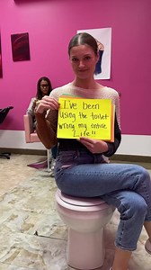 Woman shows correct way to use the toilet.￼ | Tommy Wind