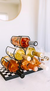 Display and store your favorite vintages with the Courtly Check Wine Rack.  A great gift for your favorite host, especially when paired with a bottle or two. Shop it here: https://bit.ly/3ZTFUcA | MacKenzie-Childs | Facebook