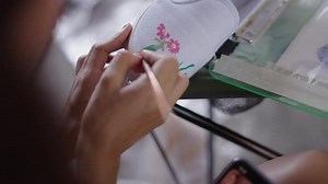 The Stem of a Flower is Painted on a Shoe