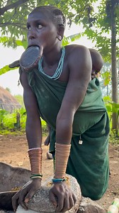 3.5M views · 21K reactions | A Surma woman sits on the ground, her...