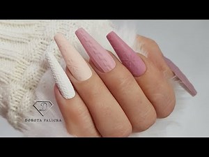 Gradient pink nails in matt with embossed knitted nail art. Jumper, snowflake, hearts