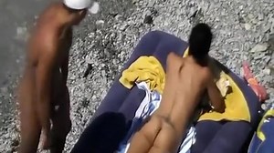 Nudist fucked in air mattress in beach