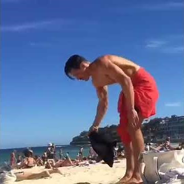 Changing clothes and putting on swimwear at the beach