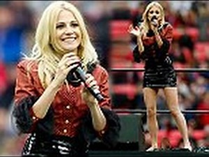 Pixie Lott puts her toned legs on display in a shimmering miniskirt as she performs barefoot during