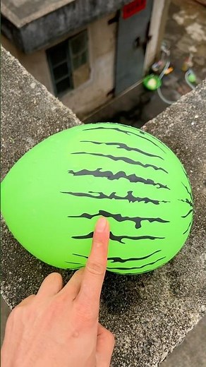 #balloon Experiment: Will a water balloon explode if it rolls down from a tall building? 💥