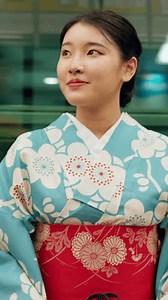 clip-3629340599-japanese-woman-traditional-clothes-travel-train-station