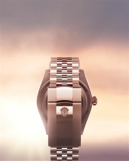 The symphony of reflections. Sophisticated, technical and distinguished, the Oyster Perpetual Sky-Dweller in 18ct yellow or Everose gold with a Jubilee bracelet. Designed to enable tireless travellers to rapidly find their bearings, the @Rolex Sky-Dweller affirms its elegance and is a delight to the senses. #Rolex #SkyDweller #OfficialRolexRetailer | Alson Jewelers | Facebook