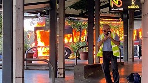 Phone captures moment Sydney bus engulfed by flames on Parramatta Road in Glebe