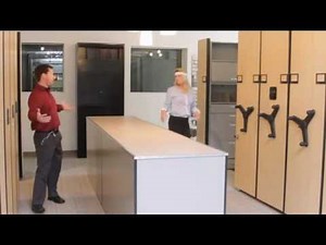 High Density Storage Funny Video | Motorized Shelving vs Hand Crank Shelves Championship Match