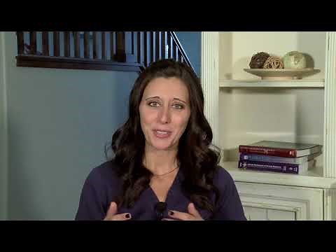 What are the early signs of breast development?