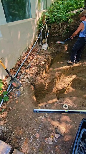 Turning a hole into a cliff side waterfall and pond! #landscaping #ponds #aquascape #countrylifestyle #backyard #work | Rockscapes