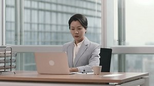 Young Asian Woman Manager Sitting Desk Stock Footage Video (100% Royalty-free) 1100387001 | Shutterstock