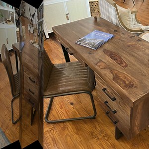 Crafted for Success! Whether you’re penning your next novel or powering through emails, this beautiful rosewood desk is your ideal companion. Made with solid rosewood and sturdy steel frame, this 50x22x30" desk is designed to keep you focused and inspired. Bring elegance and efficiency to your workspace! | Old Charleston Trading Company