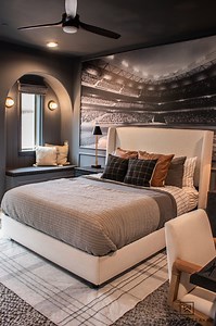 Another home run by Taryn Whiteaker Designs, this baseball-themed bedroom knocks it out of the park ⚾ Featuring new light fixtures, a cooling ceiling fan, and fresh furniture, this boy’s room makes for the ultimate dream team headquarters, and a beautiful space to grow into. #mylampsplus See more of this space: https://tarynwhiteaker.com/boys-bedroom-furniture-lighting. Featured: Cadet Black & Natural Acacia Wall Sconce- Style 88V90 Windspun Bronze Matte Black Ceiling Fan- Style 043A1 Marais Age