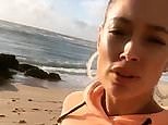 Doutzen Kroes goes for blissful walk on the beach before shoot
