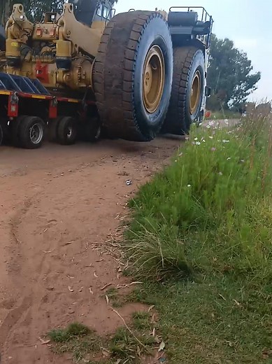 Farm Tractor Falls Into Giant Pothole