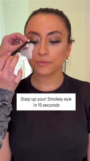 Use a tissue to stop shadow from falling on your face. Use the Medium Crease Brush and dab a black eyeshadow in the corner. Then use the Medium Blending Brush to softly blend it out. Quick and easy! #smokeyeye #makeup #makeuptips #eyeshadow #eyeshadowtips #makeuptutorial #beauty #beautytips #pinkdustcosmetics #makeupideas #makeupvideo