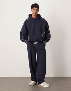 ASOS DESIGN baggy trackies and hoodie set with side piping in navy | ASOS