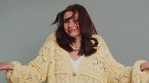 Woman raising hands in indignant expression ask why what reason of failure demonstrating disbelief | Premium Stock Video Footage