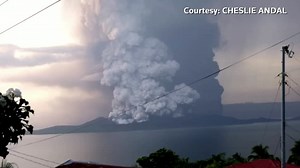 Lightning strikes as ash spews from Philippine volcano