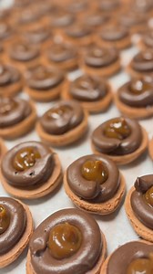 Our French macaron flavors this month are 👌🏻 Cadbury Mini Egg, Cotton Candy Marshmallow Peep, Chocolate Caramel, Red Velvet, Pistachio, Birthday Cake, Toasted Almond and more to make total of 12 delicious flavors which are available daily and did I mention they are all gluten free?!! | Sugar Bakery