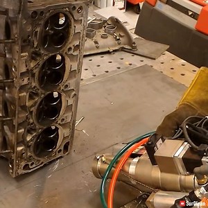 5.4M views · 11K reactions | This laser removes the carbon buildup and oil from a cylinder head. Via SurClean, Inc. | Interesting Engineering | Facebook